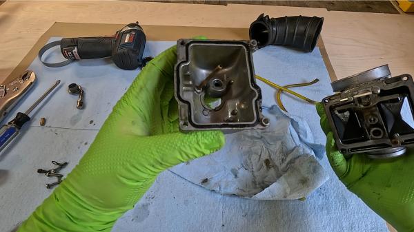 Opening Float Boal to Inspect & Clean Opening Float Boal to Inspect & Clean